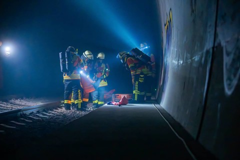 Fire brigade team in the tunnel during an exercise with various utensils, fire brigade exercise in