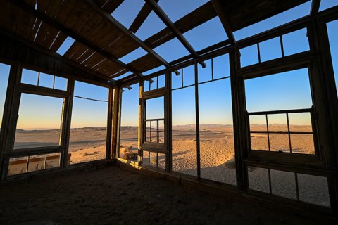 View from a former dwelling house into the desert, Kolmanskop, restricted diamond area, Karas