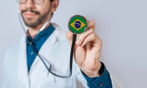 Doctor holding stethoscope with Brazil flag. Brazil health and care concept. Brazil flag on