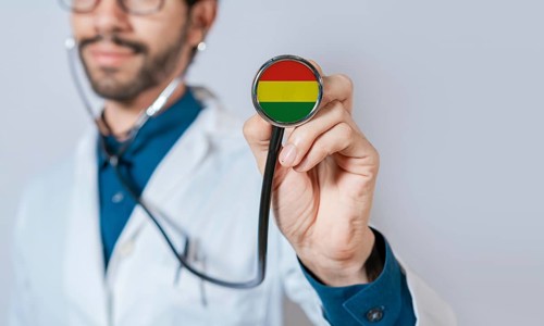 Doctor holding stethoscope with Bolivia flag. Bolivia health and care concept. Bolivia flag on