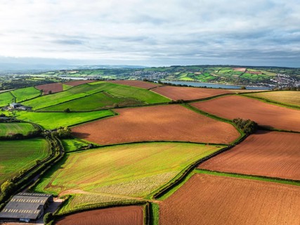 Fields and Farms at evening sun from a drone, Shaldon, Torquay, Devon, England, United Kingdom