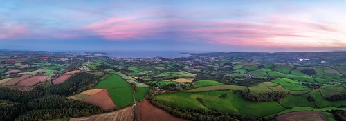Twilight Sky of Torbay farms and fields from a drone, Totnes, Berry Pomeroy, Devon, England, United