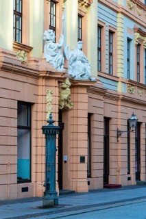 Statues above the entrance door at the Romanus House, Brühl, Leipzig, Saxony, Germany