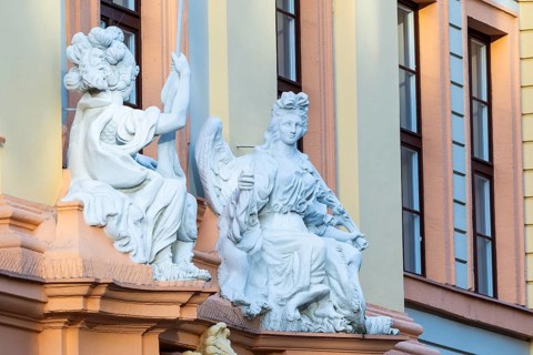 Statues above the entrance door at the Romanus House, Brühl, Leipzig, Saxony, Germany