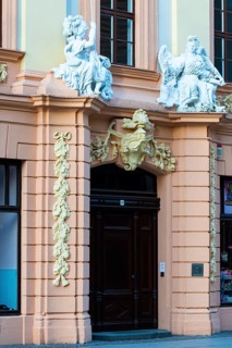 Entrance door with statues at the Romanus House, Brühl, Leipzig, Saxony, Germany
