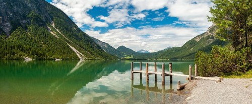 Jetty on Lake Heiterwanger See in the Ammergau Alps, Heiterwang near Reutte, Tyrol, Austria
