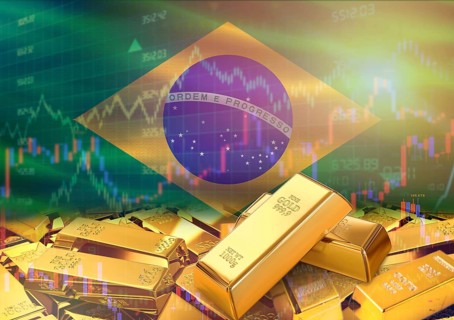 Gold bars on Brazil flag in background. Gold bars stacked on Brazilian flag. Concept of Brazil gold