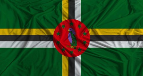 Dominican flag with fabric texture background. National flag of Dominica