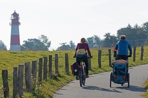 Lighthouse, cyclist, Falshöft, Pommerby, Schleswig-Holstein, Germany