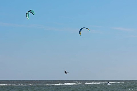 Kitesurfer jumping, Baltic Sea, Falshöft, Pommerby, Schleswig-Holstein, Germany