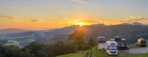 Panorama sunrise from Almhaus Hochsteinberg with camper in the car park, Kirnberg an der Mank,