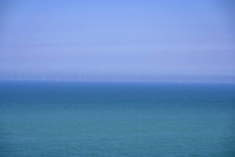 Wind turbines on the sea, hike from Yport to Etretat along the chalk cliff coast, Seine-Maritime