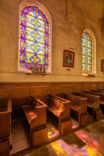 Colourful stained glass windows in the church of Saint Martin, Yport, Département Seine-Maritime,