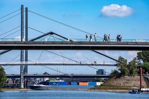 Bridges in Düsseldorf, in the foreground, the pedestrian and cycle bridge over the canal to the