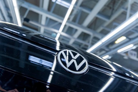 Electric car production in the assembly halls of VW in Zwickau. VW logo, Zwickau, Saxony, Germany