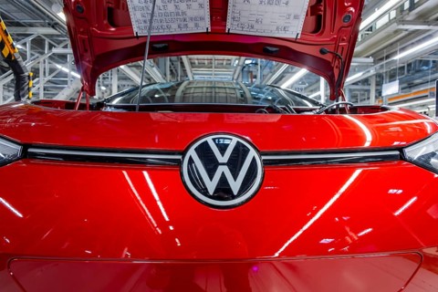 Electric car production in the assembly halls of VW in Zwickau. VW logo, Zwickau, Saxony, Germany