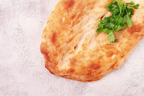 Georgian lavash bread, freshly baked, top view, on the table, no people