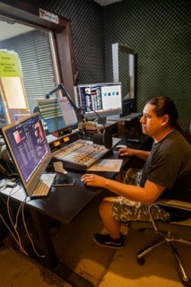 Porcupine, South Dakota - Lucian Little White Man broadcasts on KILI Radio, the voice of the Lakota