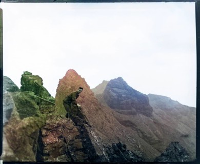 Climber on rocks, Cuillin mountains, Skye, Scotland, UK c 1900-1920 colourised image