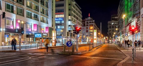 Night shot of Friedrichstraße at the railway station with a view of the tram stop and the