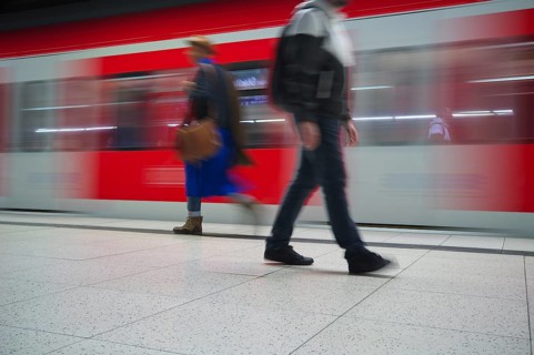 Underground arriving S-Bahn, train, class 420 in traffic red, platform, stop, Stadtmitte station,