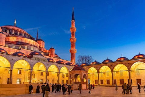 Inner courtyard of the Blue Mosque or Sultan Ahmed Mosque at dusk, Istanbul, Turkey