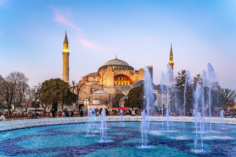 Fountain in Sultan Ahmet Park and the present-day mosque Hagia Sophia or Church of St Sophia at