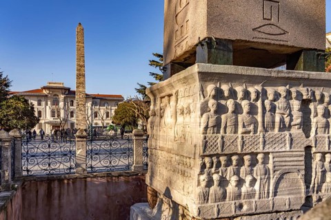 Marble base of the ancient Egyptian Obelisk of Theodosius or Obelisk of Istanbul with reliefs and