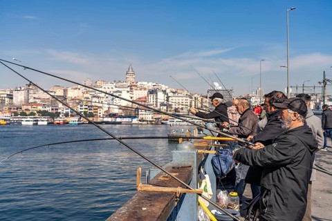 Angler on the Galata Bridge in Istanbul, Turkey