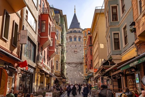 Shops, restaurants and the Galata Tower in Beyoglu, Istanbul, Turkey