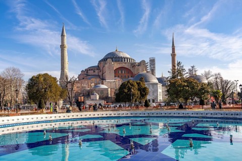 Fountain in Sultan Ahmet Park and the present-day mosque Hagia Sophia or Church of St Sophia,