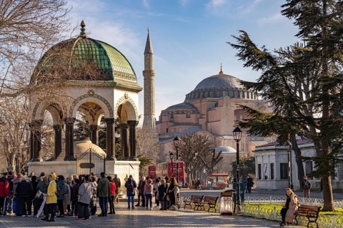 Tourists at the German Fountain or Kaiser Wilhelm Fountain and the Hagia Sophia or Church of St