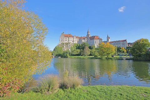 Hohenzollern Castle and Danube, river bank with autumn colours, landmark, castle, Sigmaringen,