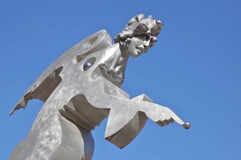 Sculpture guardian angel by Jürgen Goertz, modern art, water basin, fountain, bizarre shining angel