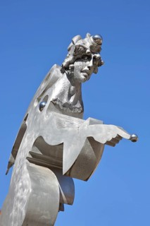 Sculpture guardian angel by Jürgen Goertz, modern art, water basin, fountain, bizarre shining angel