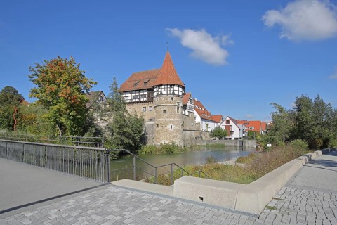 Zollern Castle built around 1255 with water tower on the bridge over the Eybach stream,
