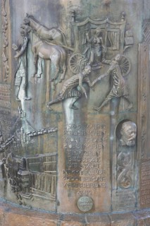 Reliefs with scenes from the town's history on the town hall fountain by Klaus Ringwald 1998,