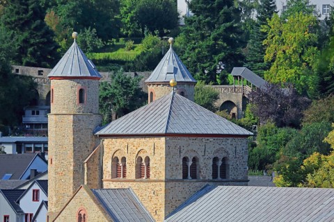Twin towers of the Romanesque collegiate church of St Chrysanthus and Daria and historic town wall,