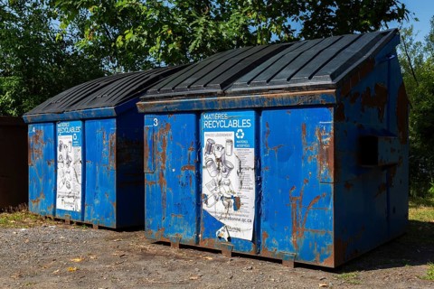 Blue metal with black plastic lid industrial size recycling bins for depositing glass, metal and
