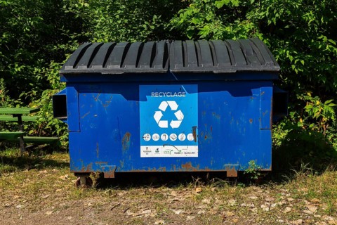 Blue metal with black plastic lids industrial size recycling bin for depositing glass, metal and