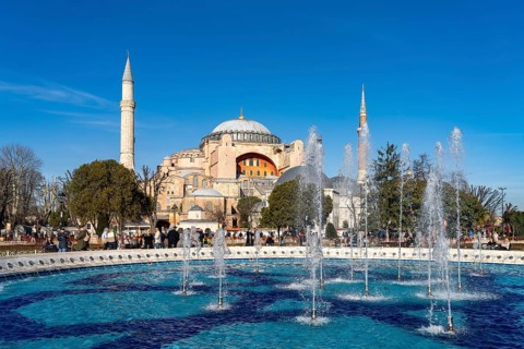 Fountain in Sultan Ahmet Park and the present-day mosque Hagia Sophia or Church of St Sophia,