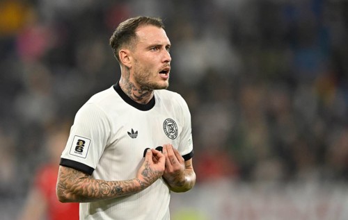David Raum GER (22) mimes innocent lamb after foul gesture World Cup qualifier, international