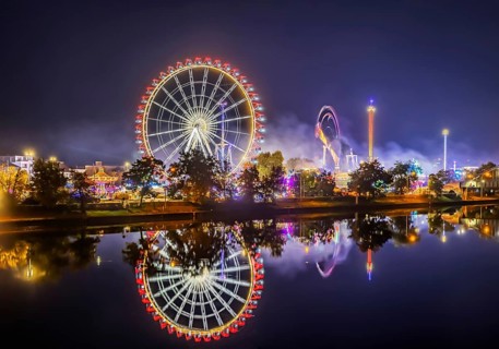 Folk festival in Stuttgart. Night shot with light effects. The 178th Cannstatter Volksfest on the