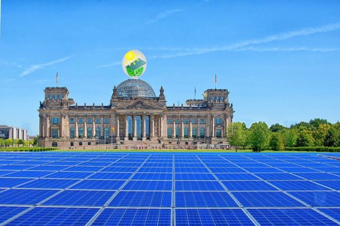 Symbolic image, solar park in the city, Reichstag building Berlin with environmental logo, modules