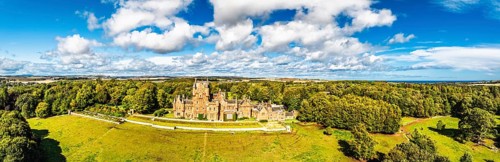 Panorama of Ayton Castle from a drone, Ayton, Eyemouth, Scottish Borders, Scotland, UK