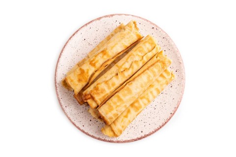 Waffles with caramel isolated on white background, top view, flat lay, close up