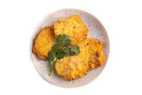 Fried crispy Chicken pancakes isolated on white background. top view, flat lay, close up