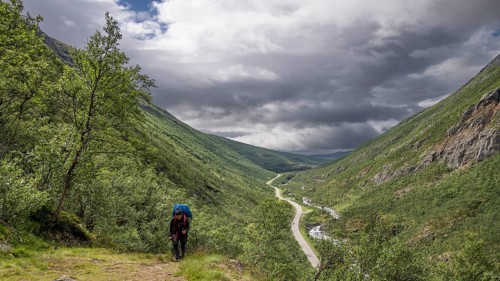 Pilgrims on the Kongevegen or King's Road, Olavsleden pilgrimage route, Drivdalen valley, ascent to