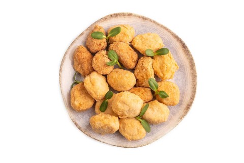 Fried crispy Chicken Nuggets with ketchup, microgreen isolated on white background. top view, flat