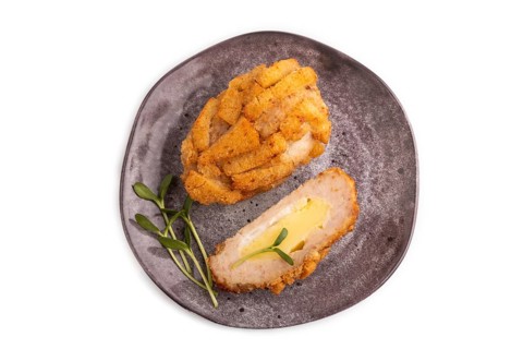 Chicken Schnitzel on gray plate with microgreen Isolated on white background. top view, flat lay,